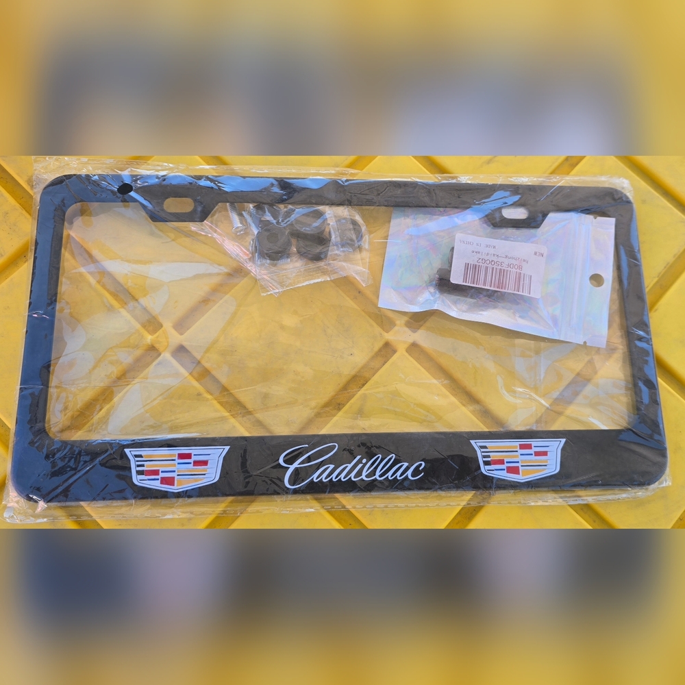 Cadillac License Plate Frame and Tire Valve Stem Caps
